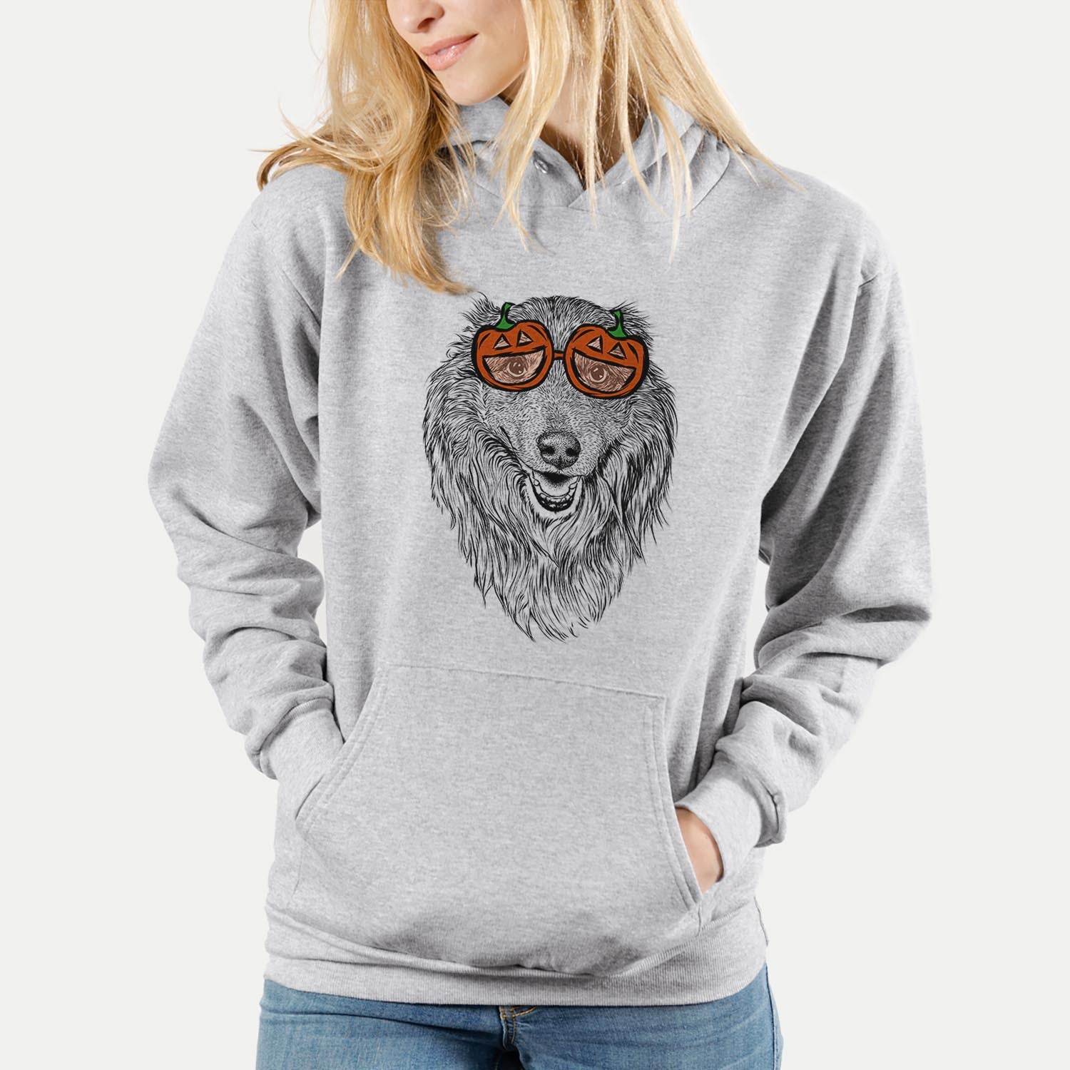 Hand-drawn sketch of Addie the Mixed Breed wearing pumpkin glasses on a Grey pumpkin collection