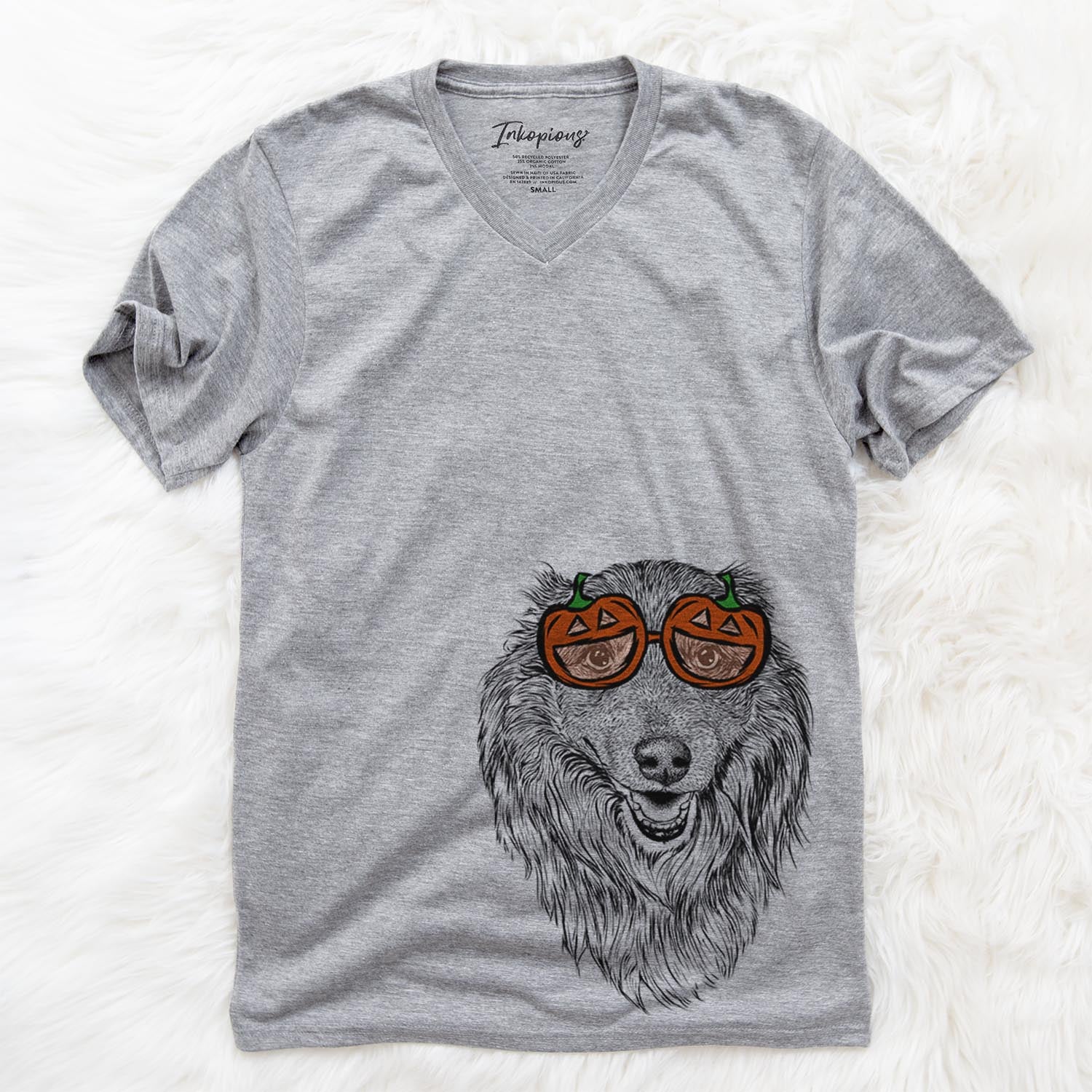 Hand-drawn sketch of Addie the Mixed Breed wearing pumpkin glasses on a Grey pumpkin collection