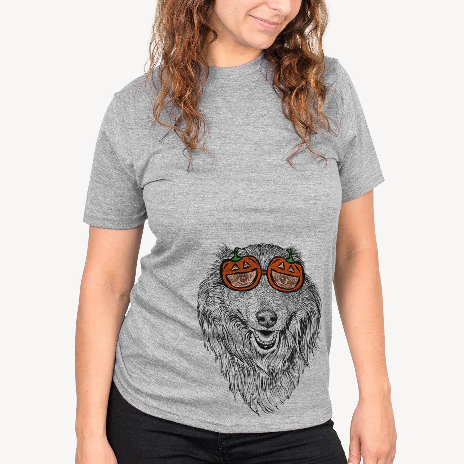 Hand-drawn sketch of Addie the Mixed Breed wearing pumpkin glasses on a Grey pumpkin collection, on a hanger