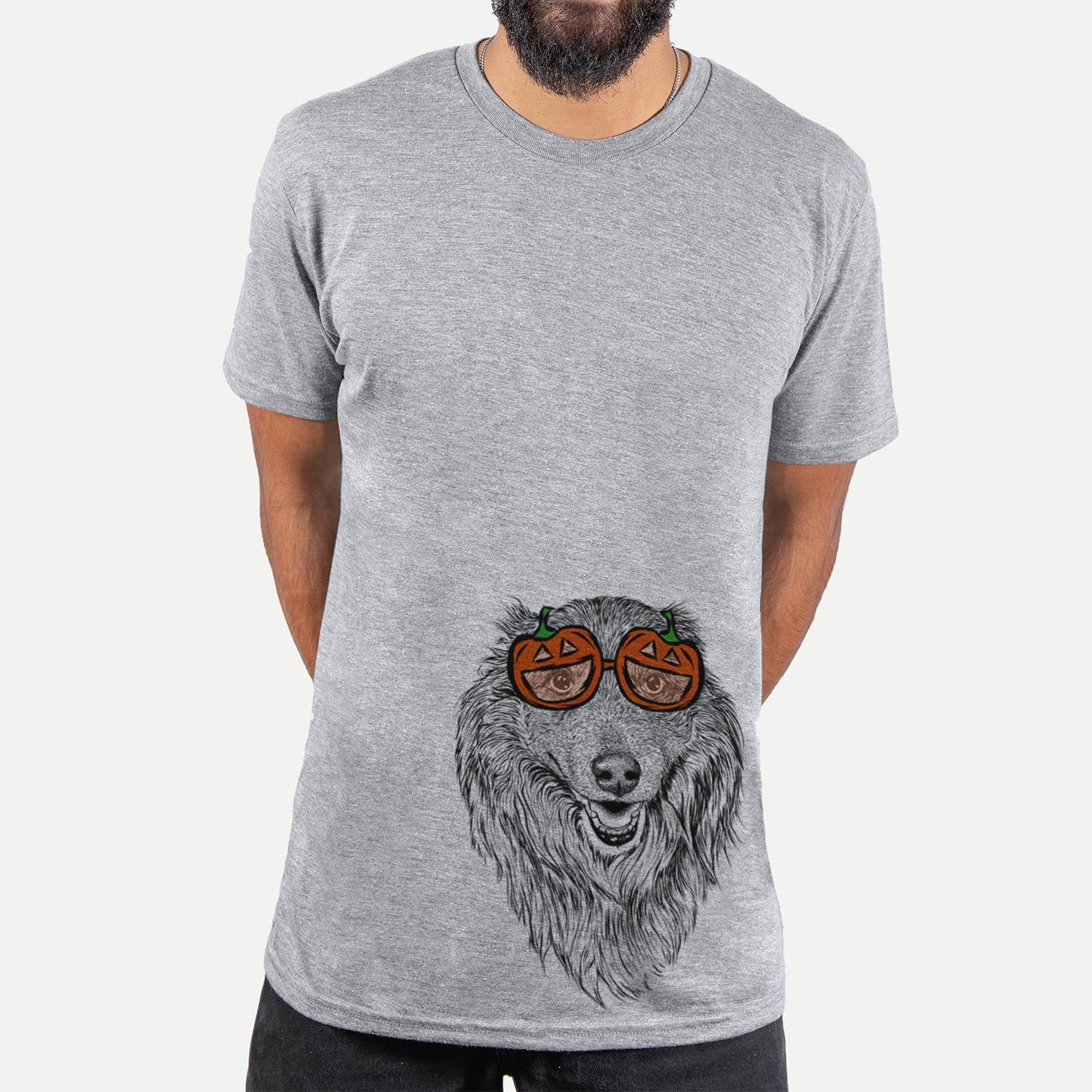 Hand-drawn sketch of Addie the Mixed Breed wearing pumpkin glasses on a Grey pumpkin collection, hanging on a wall