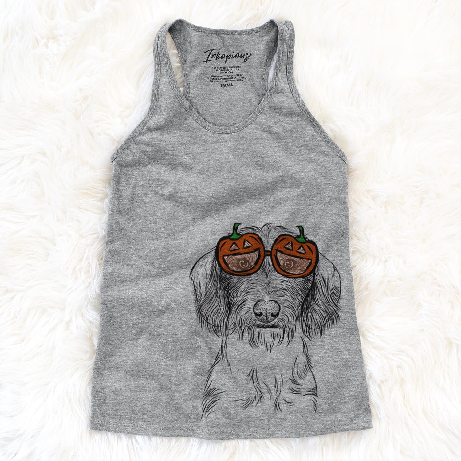 Hand-drawn sketch of Almond the Wirehaired Dachshund wearing pumpkin glasses on a Grey pumpkin collection