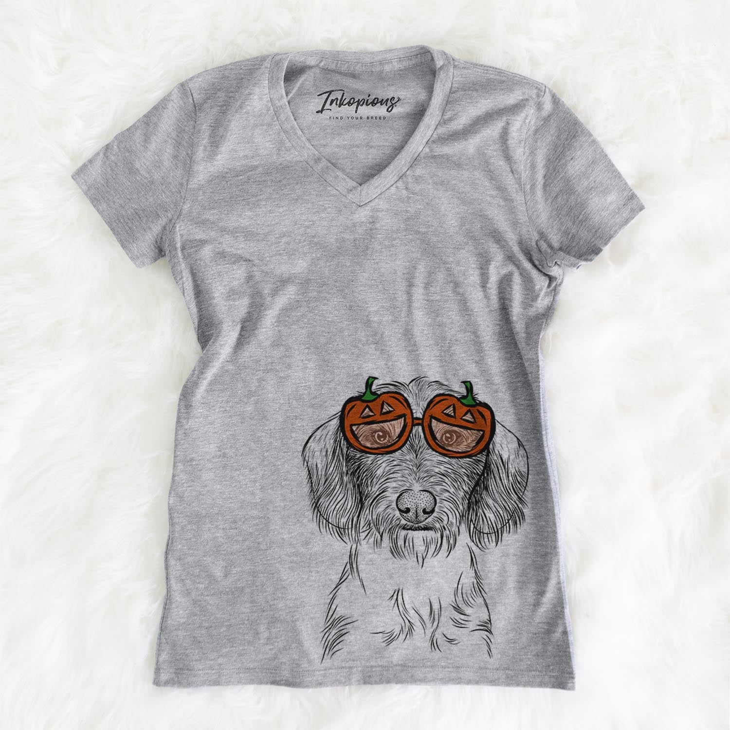 Hand-drawn sketch of Almond the Wirehaired Dachshund wearing pumpkin glasses on a Grey pumpkin collection, on a hanger