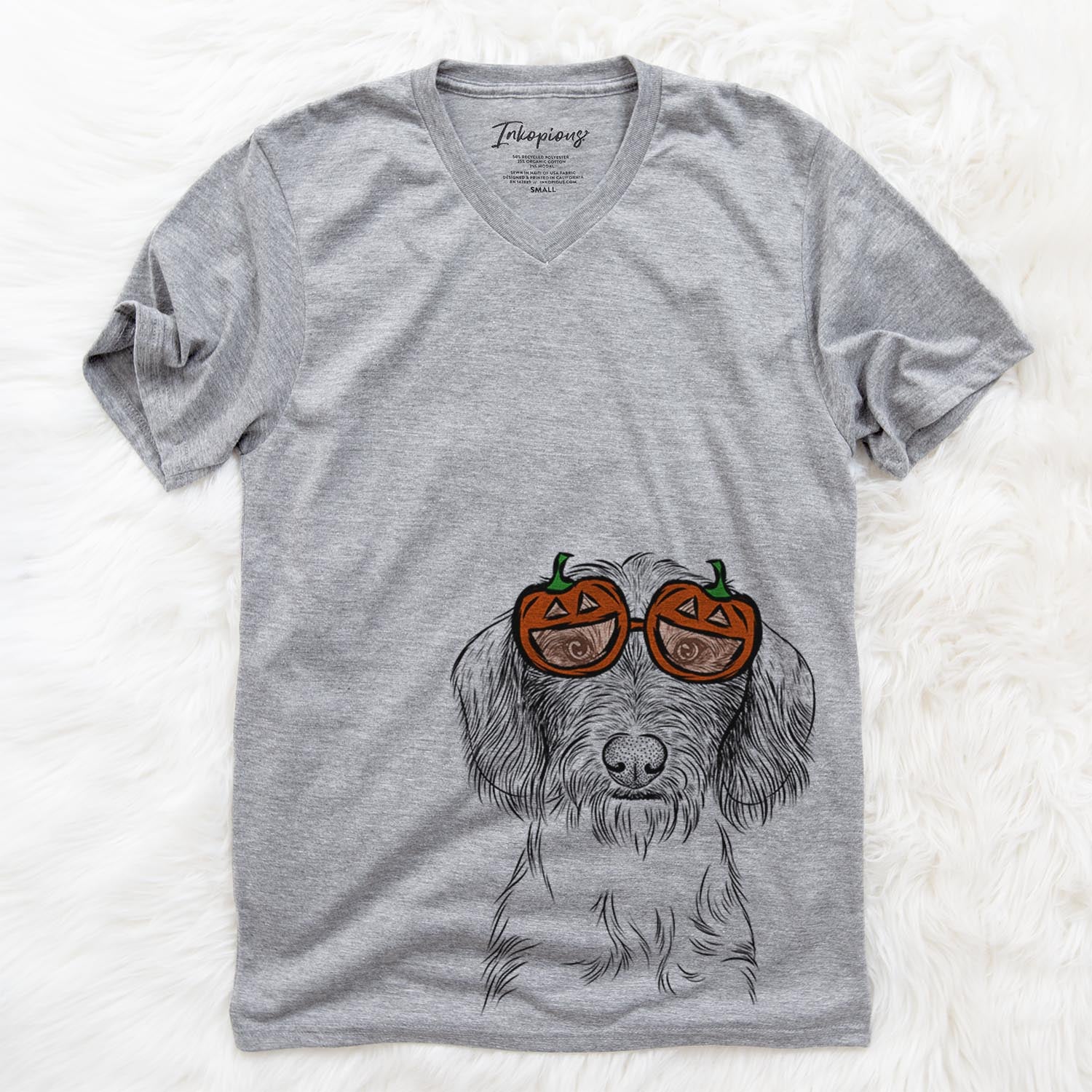 Hand-drawn sketch of Almond the Wirehaired Dachshund wearing pumpkin glasses on a Grey pumpkin collection