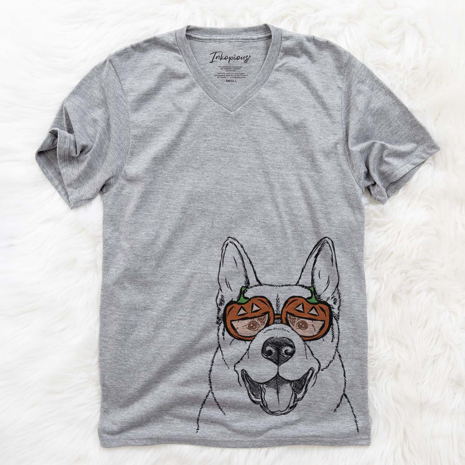 Hand-drawn sketch of Baku the Akita wearing pumpkin glasses on a Grey pumpkin collection