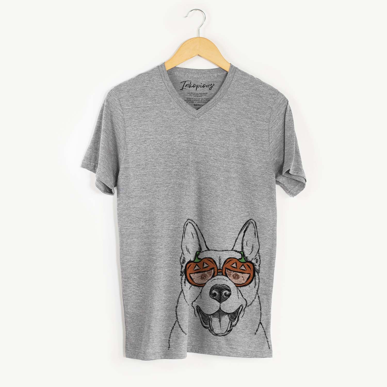 Hand-drawn sketch of Baku the Akita wearing pumpkin glasses on a Grey pumpkin collection