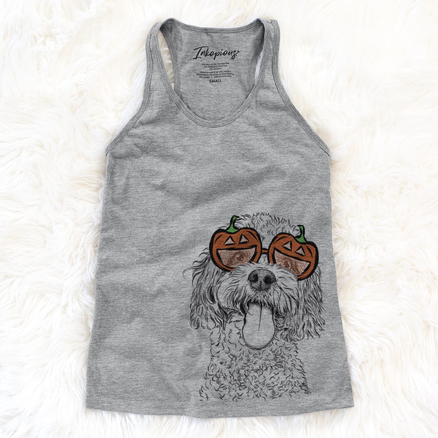 Hand-drawn sketch of Barney the Cavachon wearing pumpkin glasses on a Grey pumpkin collection
