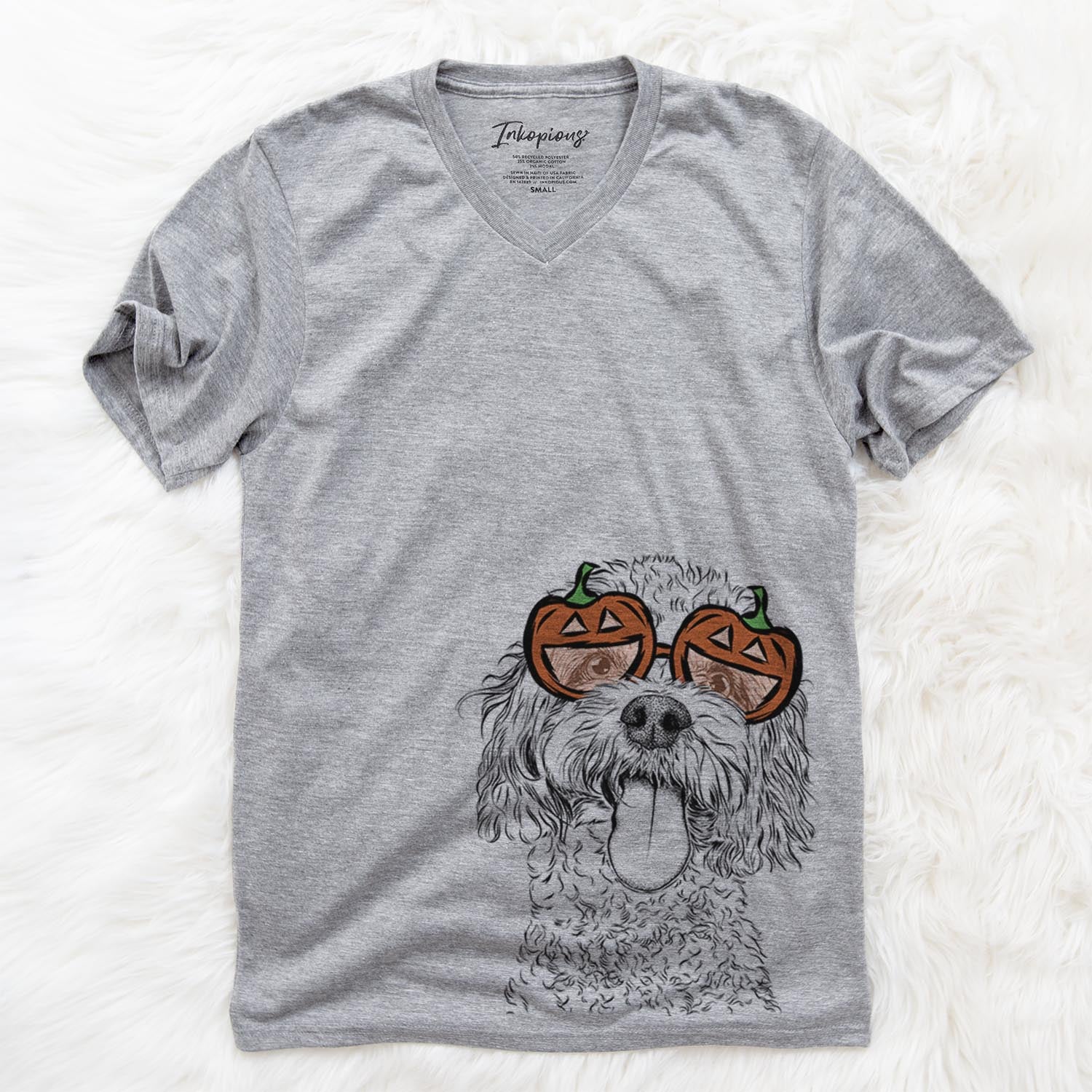 Hand-drawn sketch of Barney the Cavachon wearing pumpkin glasses on a Grey pumpkin collection