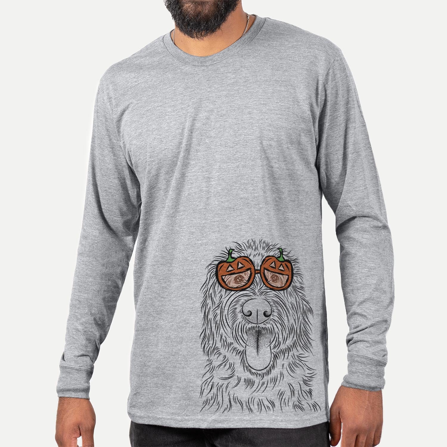 Hand-drawn sketch of Bennett the Doodle wearing pumpkin glasses on a Grey pumpkin collection, hanging on a wall