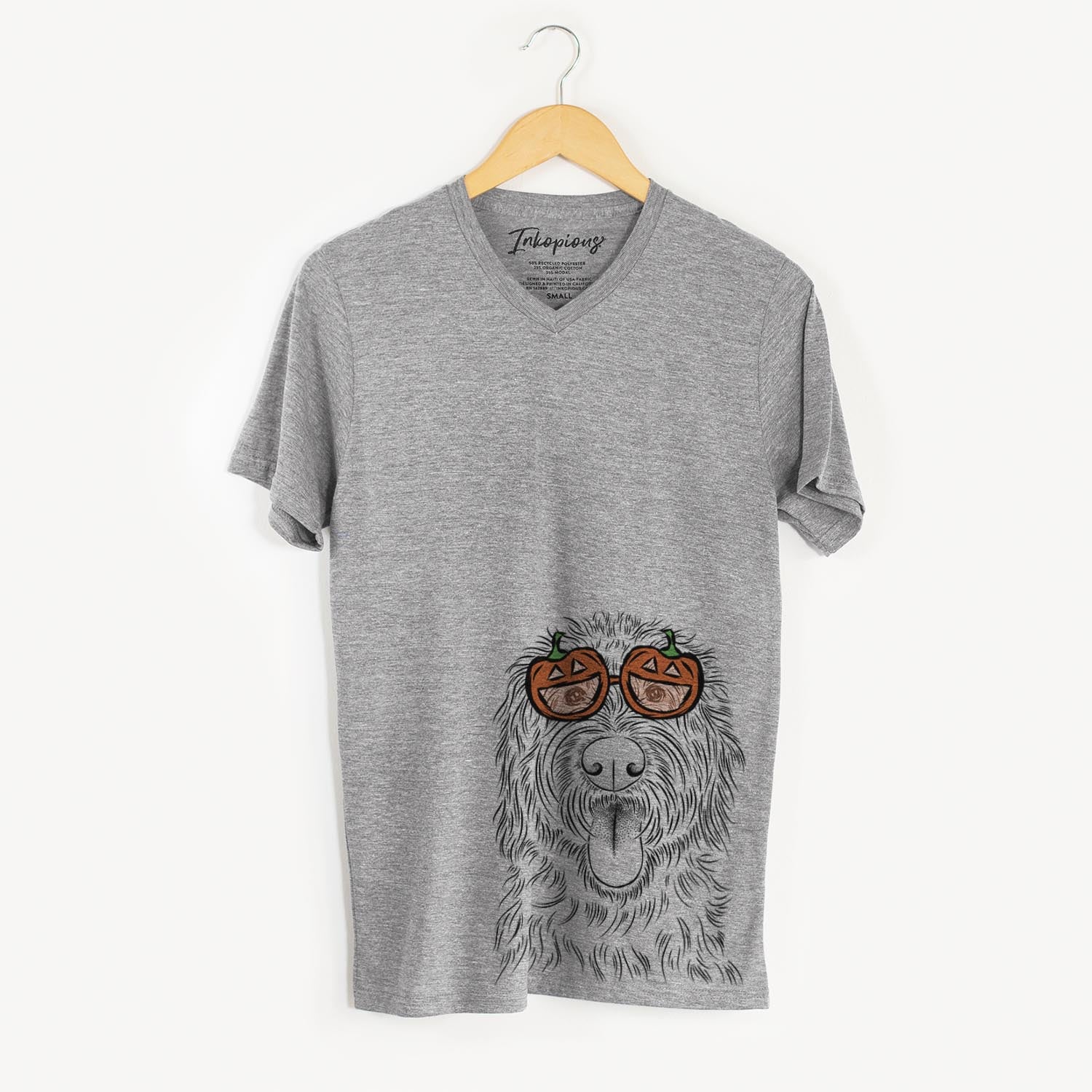Hand-drawn sketch of Bennett the Doodle wearing pumpkin glasses on a Grey pumpkin collection