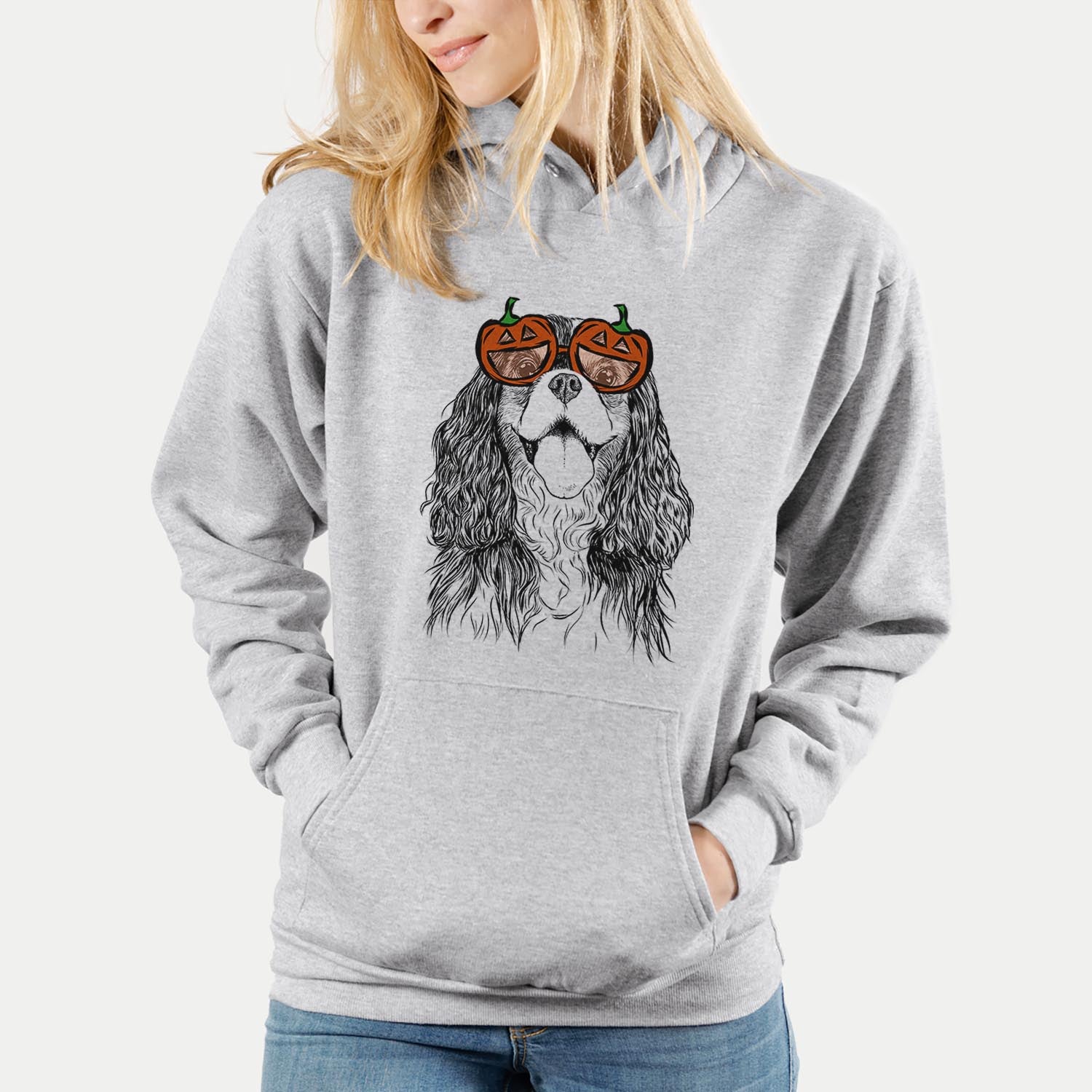 Hand-drawn sketch of Brandy the Cavalier King Charles Spaniel wearing pumpkin glasses on a Grey pumpkin collection
