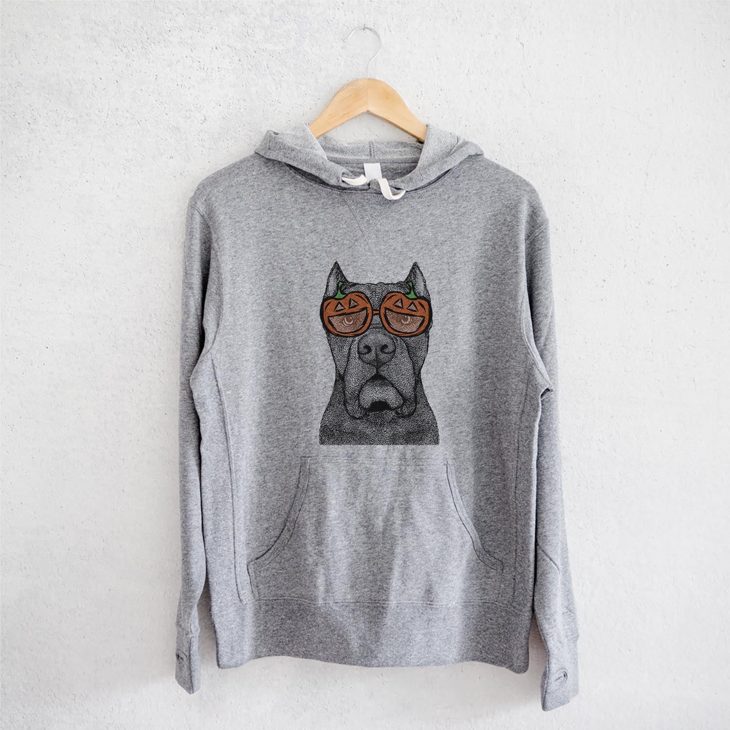 Hand-drawn sketch of Bruno the Cane Corso wearing pumpkin glasses on a Grey pumpkin collection, on a hanger