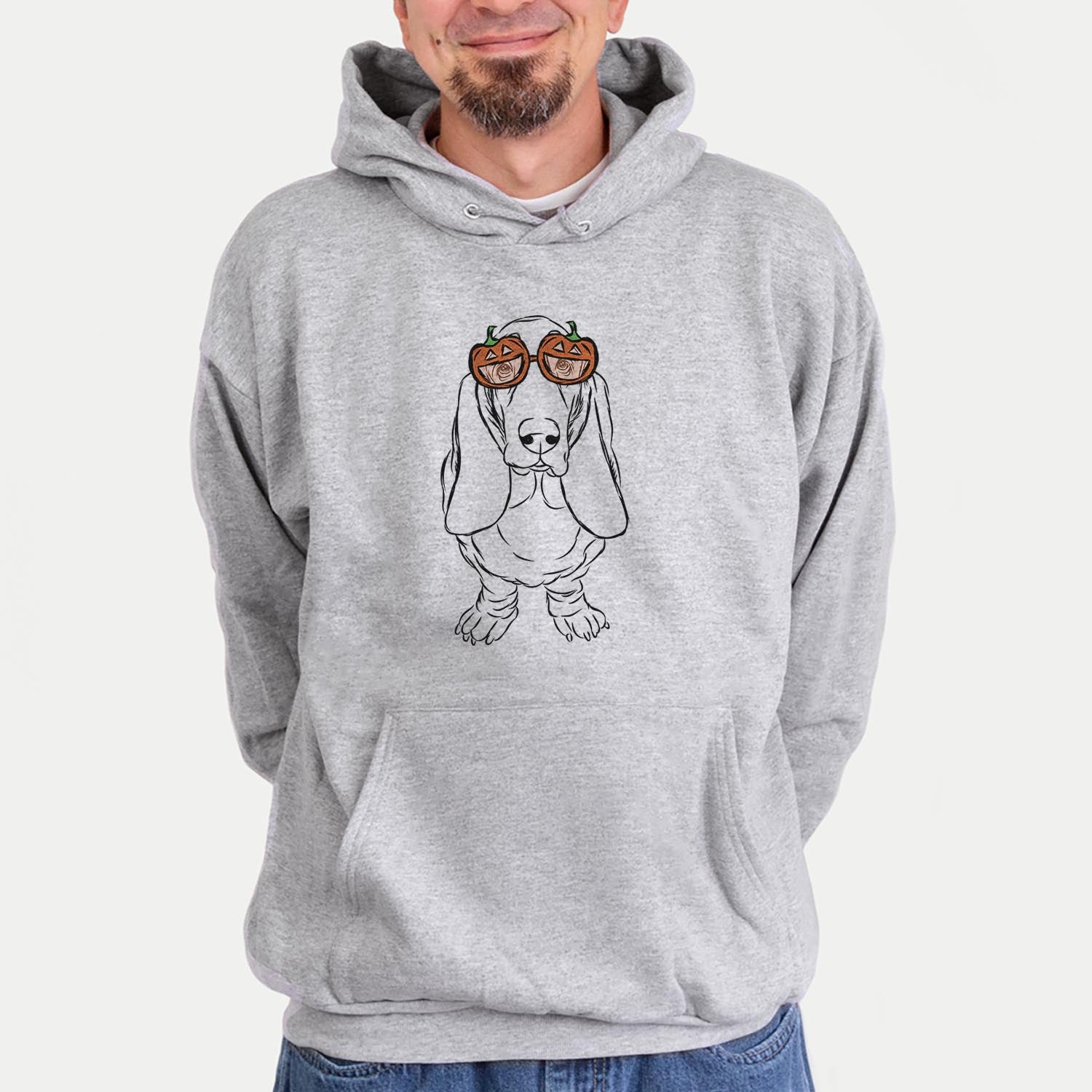 Hand-drawn sketch of Charlie the Basset Hound wearing pumpkin glasses on a Grey pumpkin collection, hanging on a wall