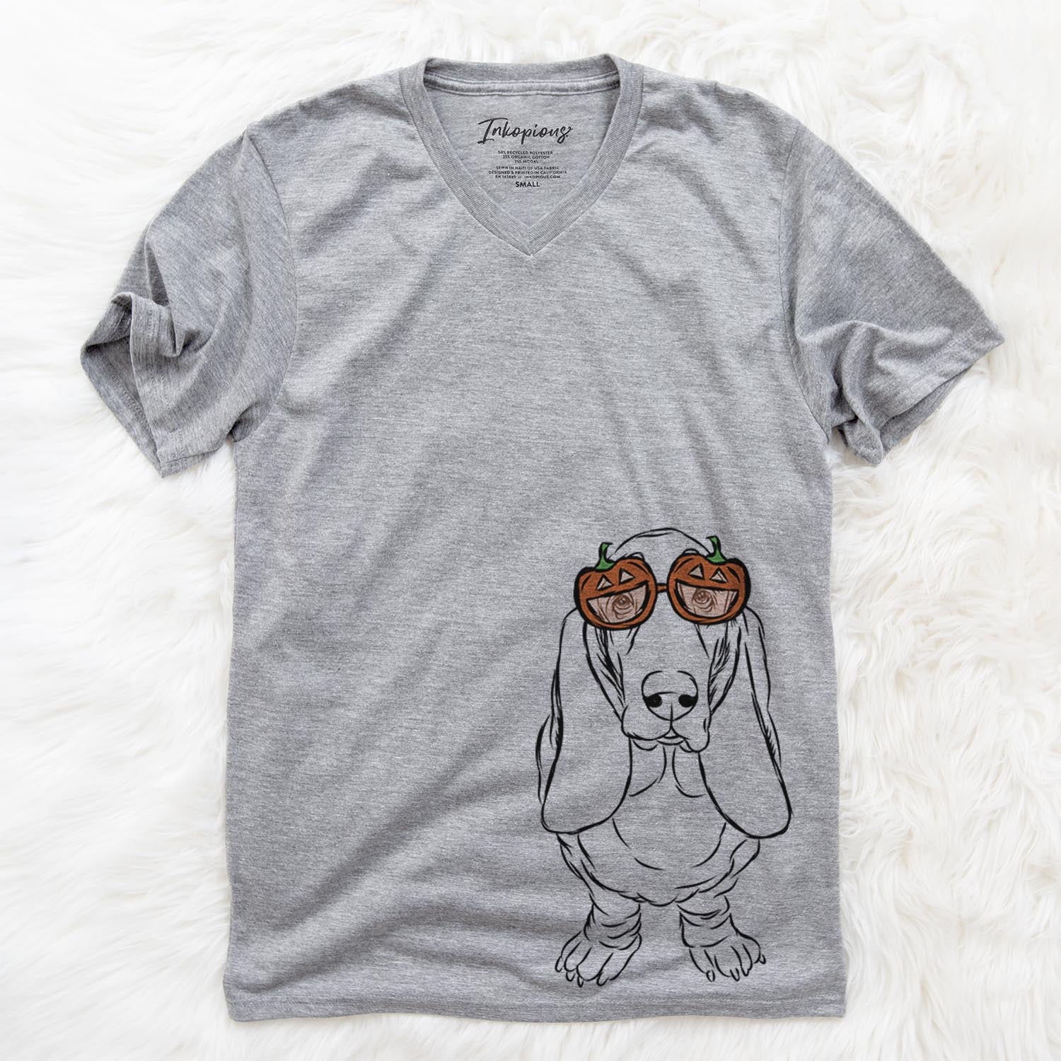 Hand-drawn sketch of Charlie the Basset Hound wearing pumpkin glasses on a Grey pumpkin collection