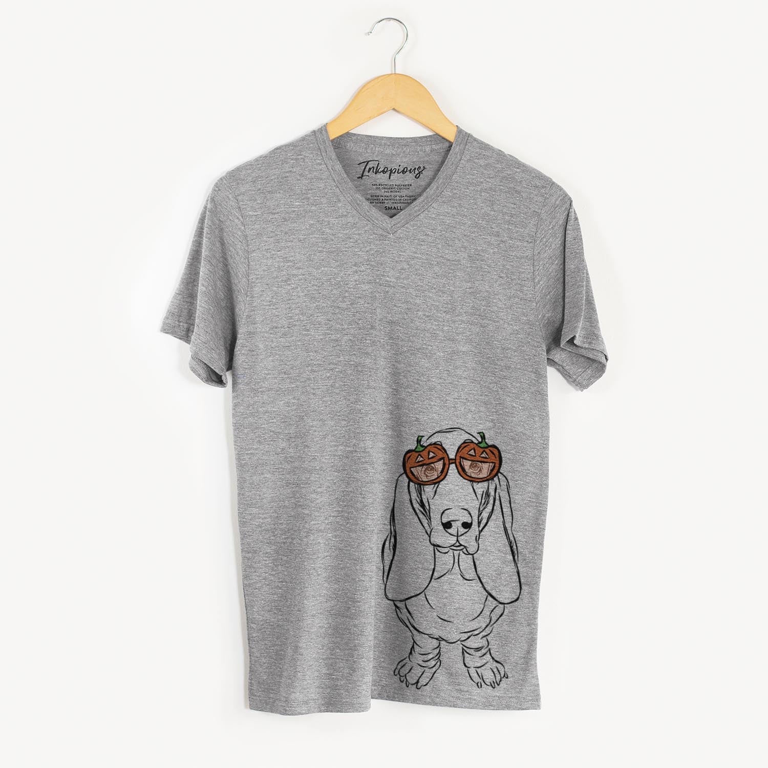 Hand-drawn sketch of Charlie the Basset Hound wearing pumpkin glasses on a Grey pumpkin collection