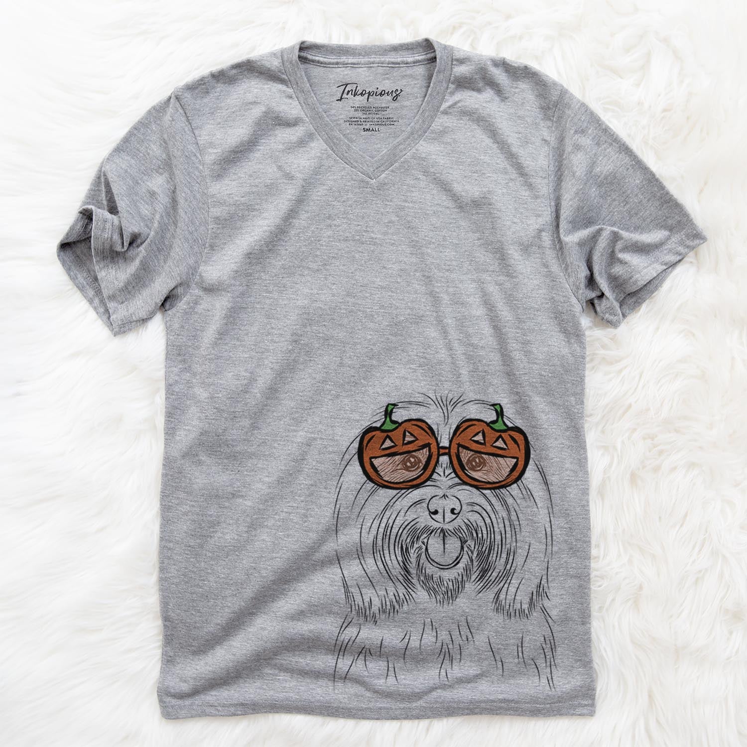 Hand-drawn sketch of Claude the Coton de Tulear wearing pumpkin glasses on a Grey pumpkin collection