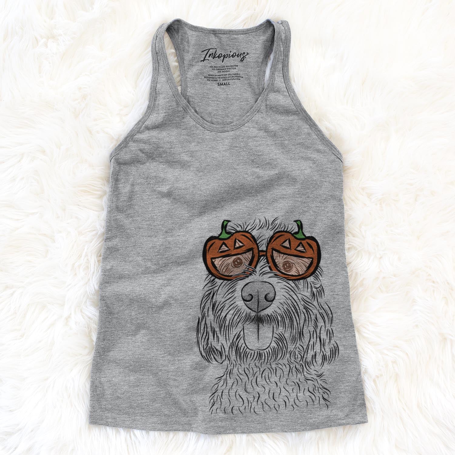 Hand-drawn sketch of Clover the Cockapoo wearing pumpkin glasses on a Grey pumpkin collection