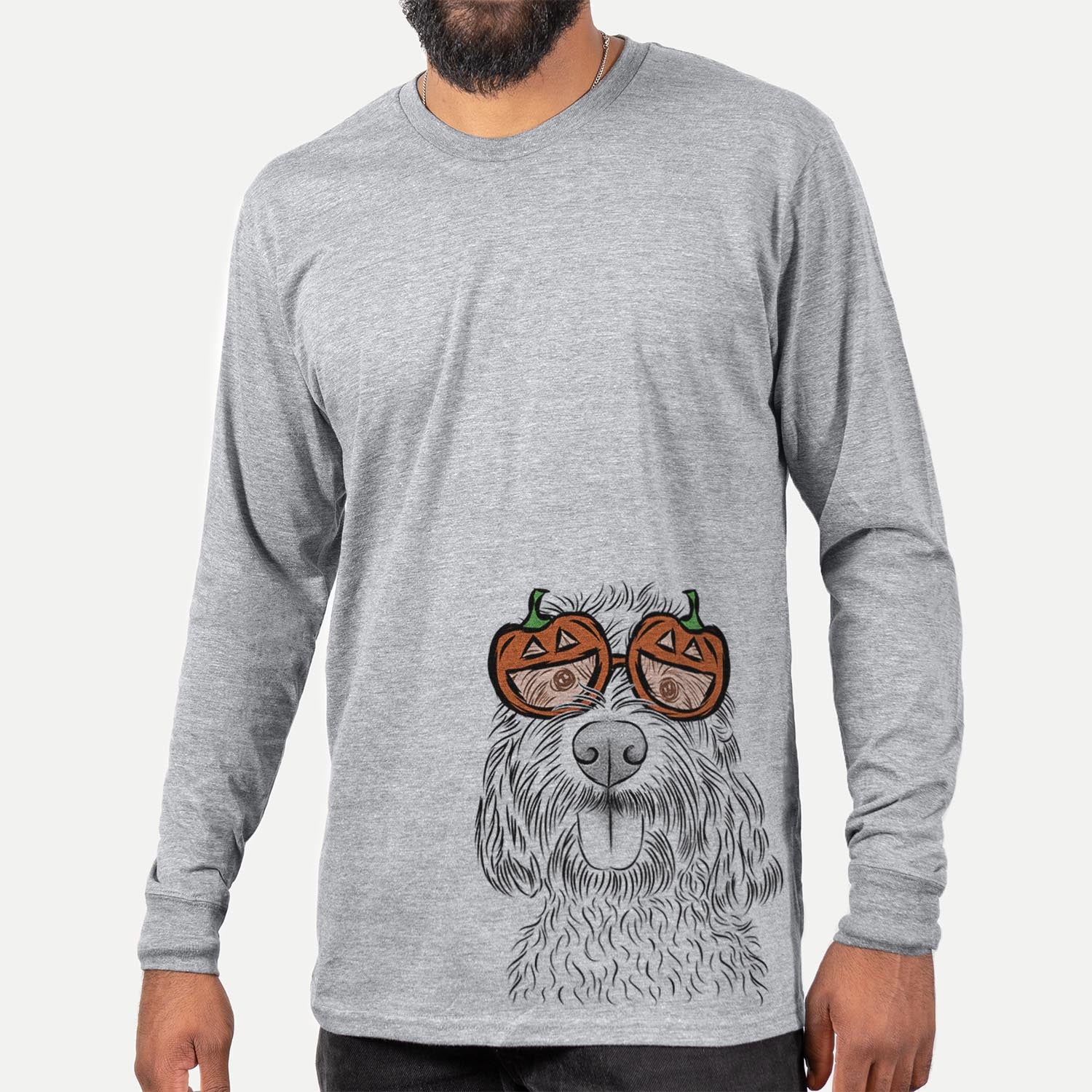 Hand-drawn sketch of Clover the Cockapoo wearing pumpkin glasses on a Grey pumpkin collection, hanging on a wall