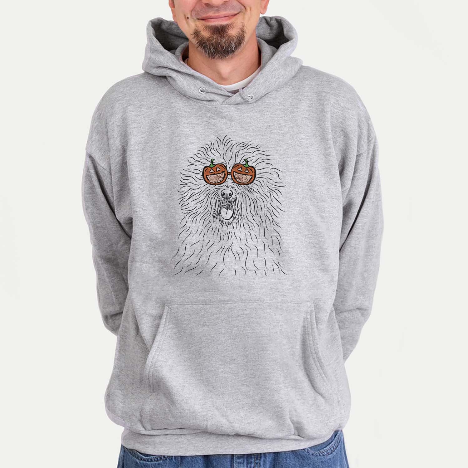 Hand-drawn sketch of Cozie the Old English Sheepdog wearing pumpkin glasses on a Grey pumpkin collection, hanging on a wall