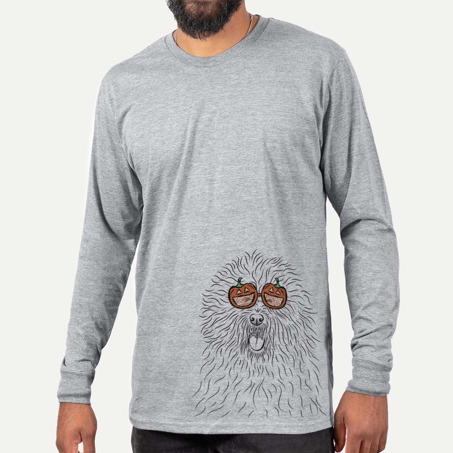Hand-drawn sketch of Cozie the Old English Sheepdog wearing pumpkin glasses on a Grey pumpkin collection, hanging on a wall