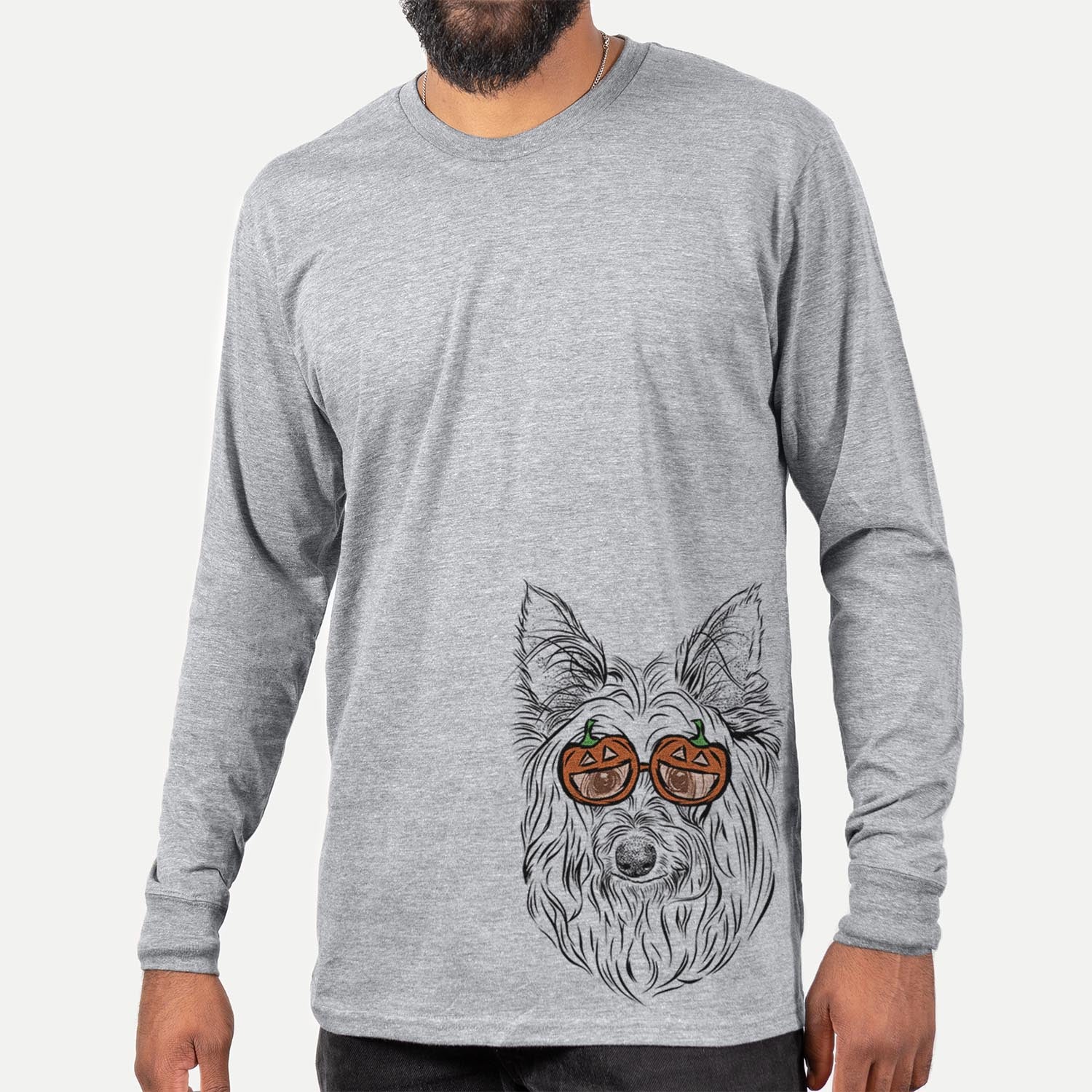 Hand-drawn sketch of Daisy May the Silky Terrier wearing pumpkin glasses on a Grey pumpkin collection, hanging on a wall