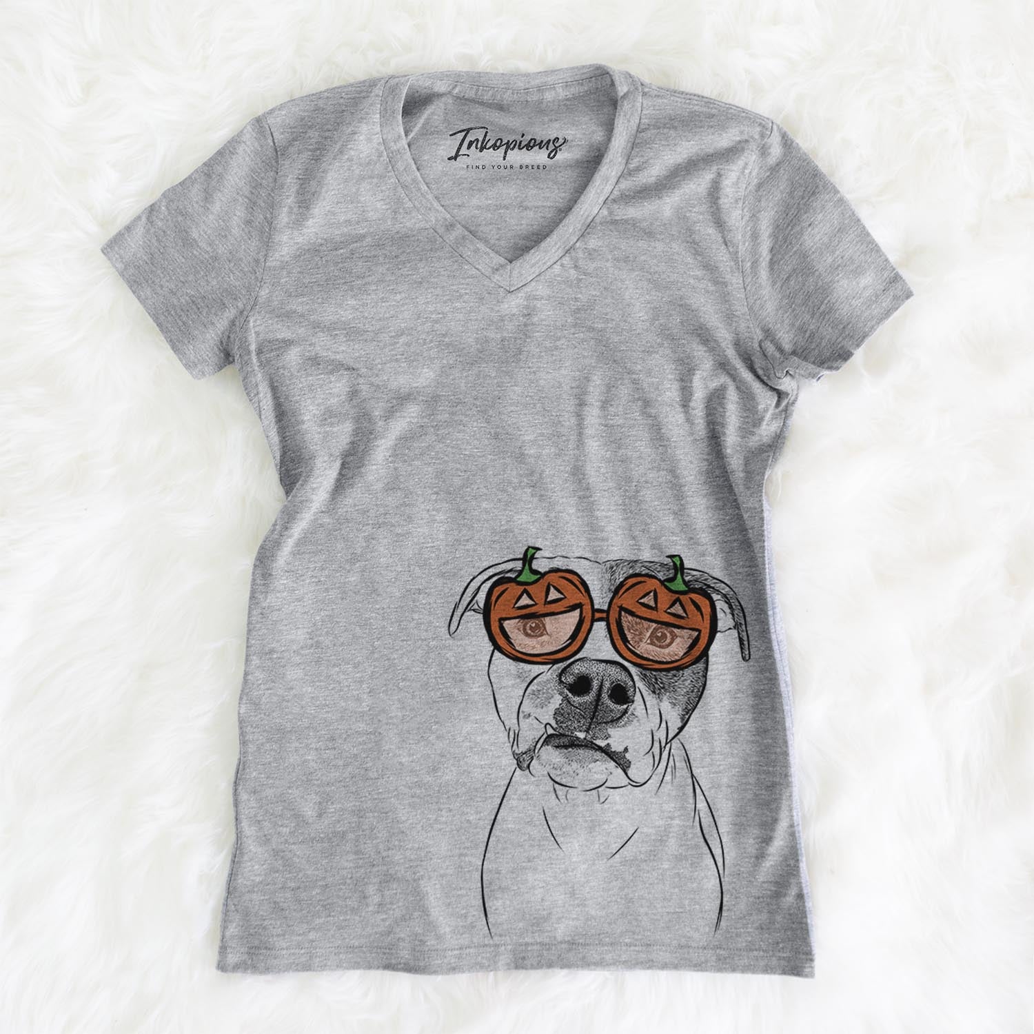 Hand-drawn sketch of Dexter the Pitbull wearing pumpkin glasses on a Dexter Pit pumpkin collection, on a hanger