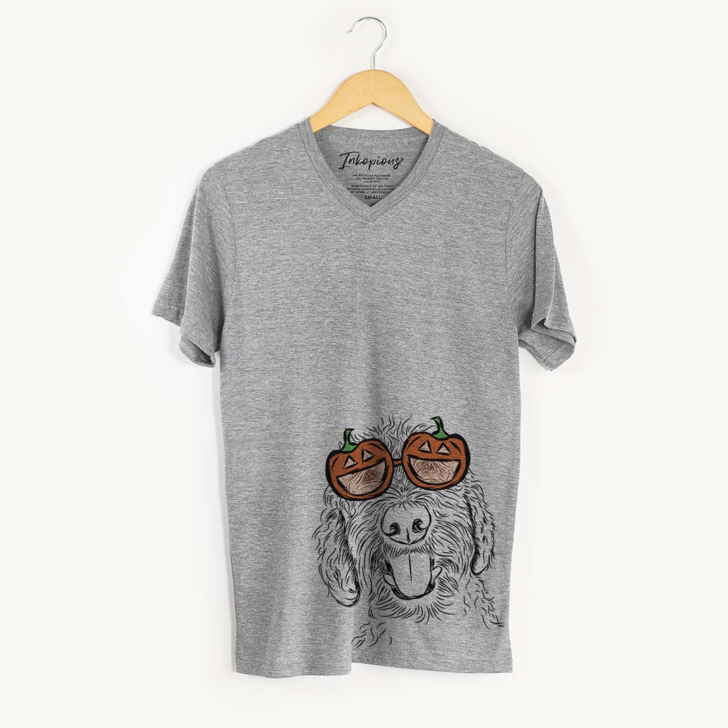 Hand-drawn sketch of Dixie the Doodle wearing pumpkin glasses on a Grey pumpkin collection