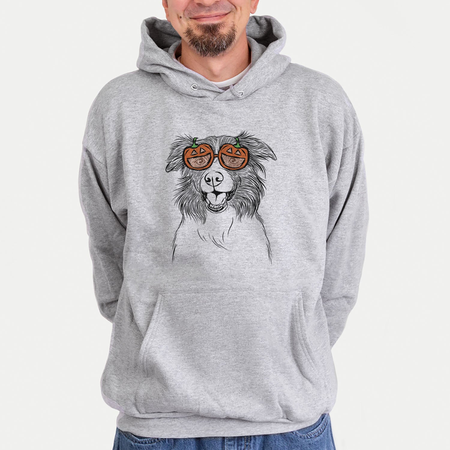 Hand-drawn sketch of Dizzy the Border Collie wearing pumpkin glasses on a Grey pumpkin collection, hanging on a wall