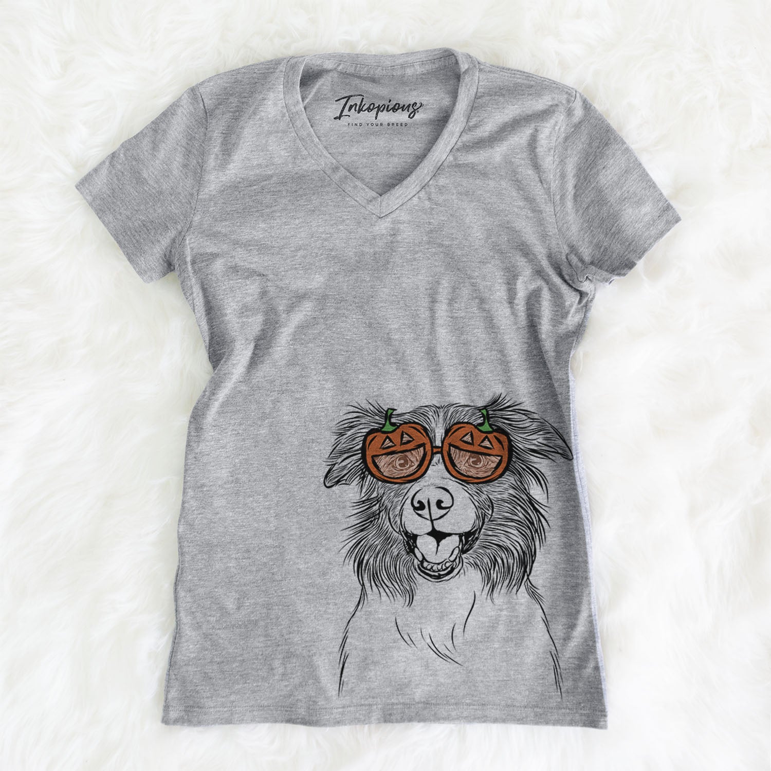 Hand-drawn sketch of Dizzy the Border Collie wearing pumpkin glasses on a Grey pumpkin collection, on a hanger