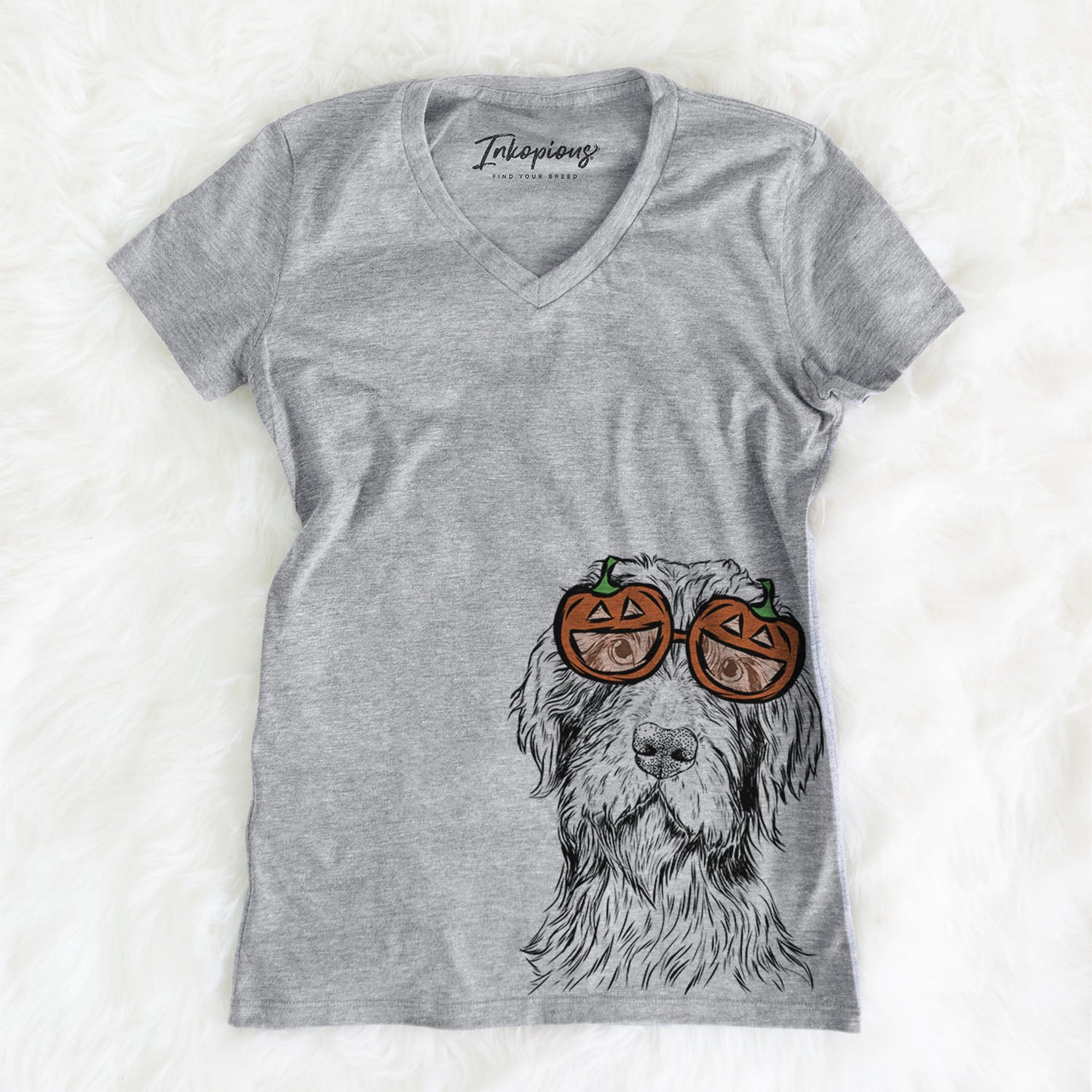 Hand-drawn sketch of Doc Holliday the Pudelpointer wearing pumpkin glasses on a Grey pumpkin collection, on a hanger