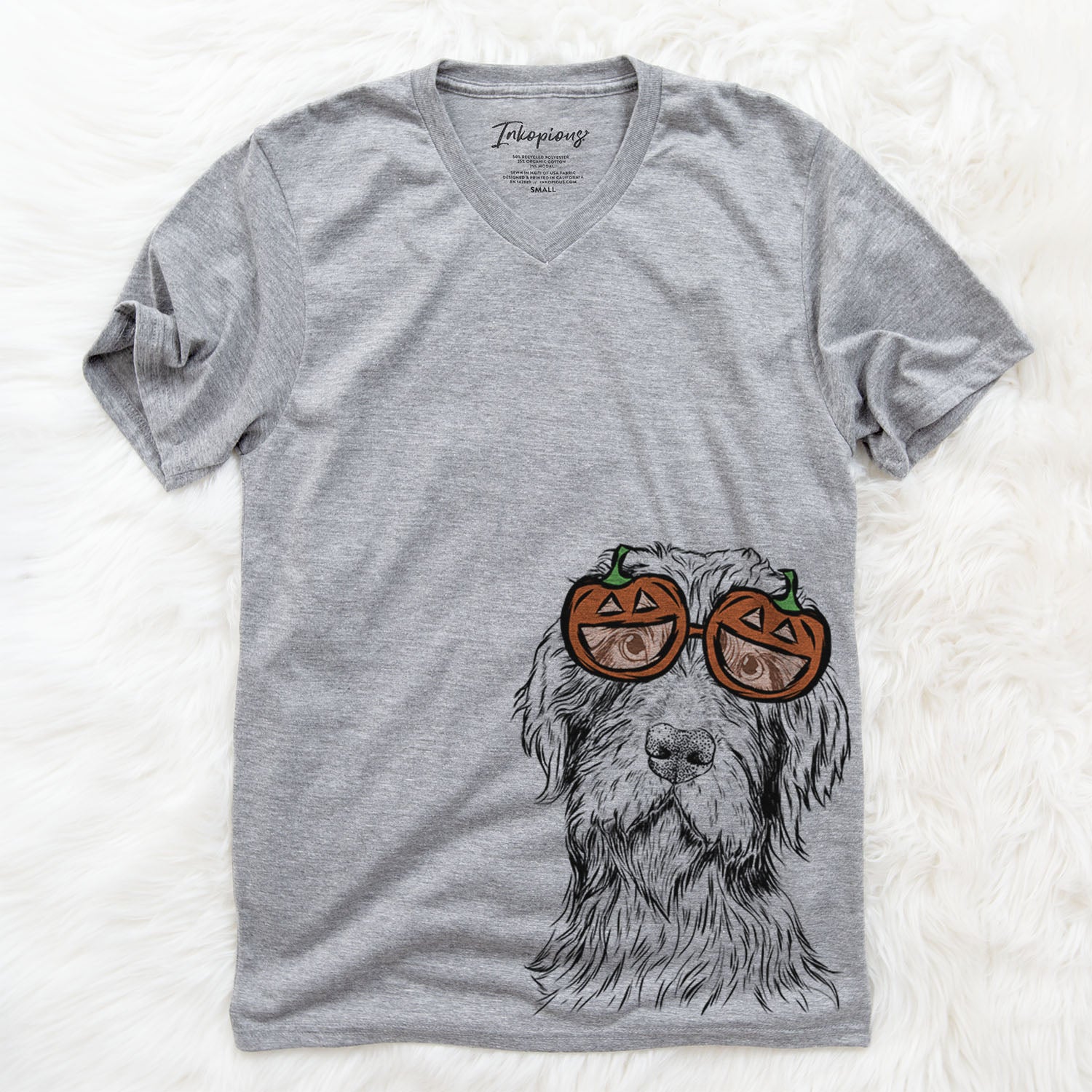Hand-drawn sketch of Doc Holliday the Pudelpointer wearing pumpkin glasses on a Grey pumpkin collection
