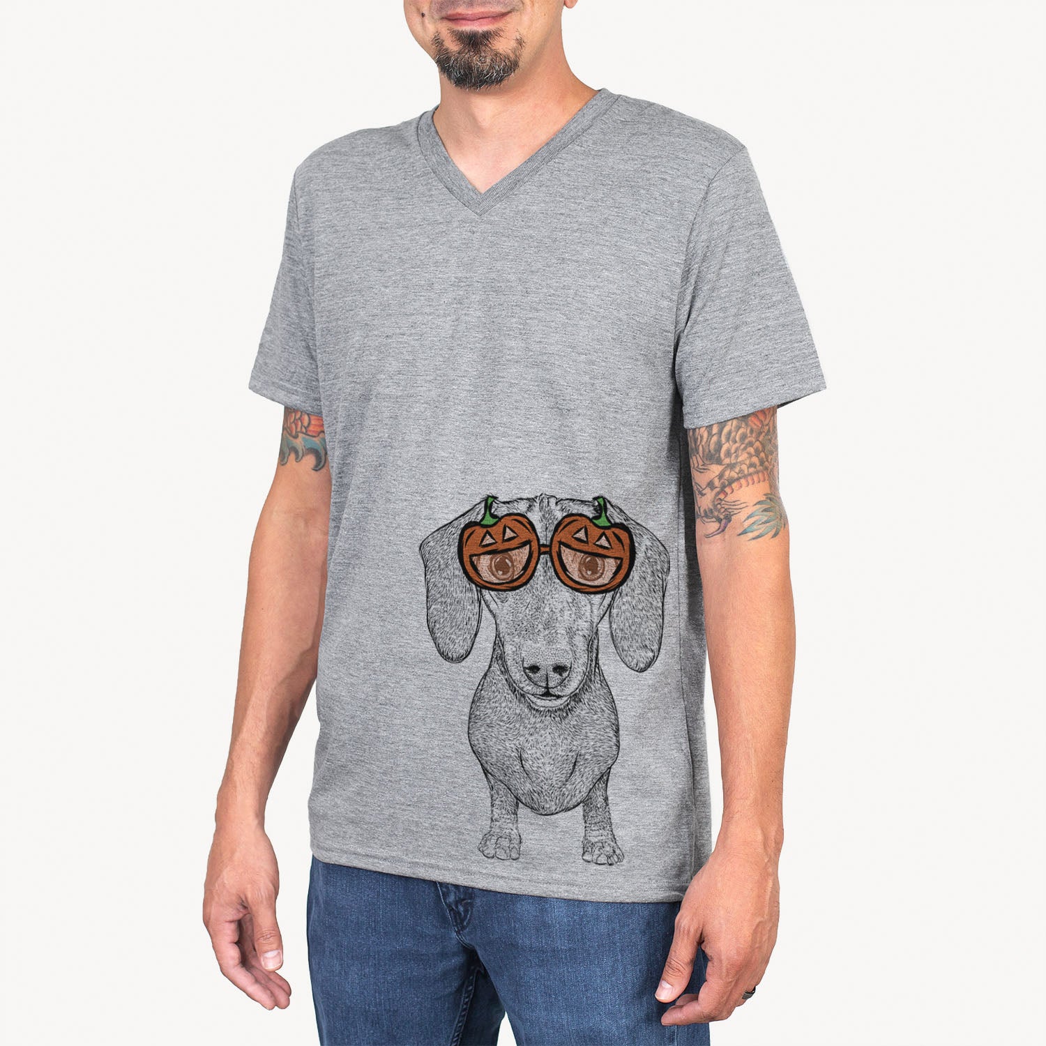 Hand-drawn sketch of Ernie the Mini Dachshund wearing pumpkin glasses on a Grey pumpkin collection