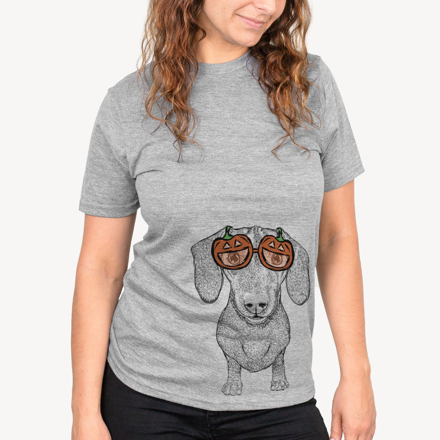 Hand-drawn sketch of Ernie the Mini Dachshund wearing pumpkin glasses on a Grey pumpkin collection, on a hanger