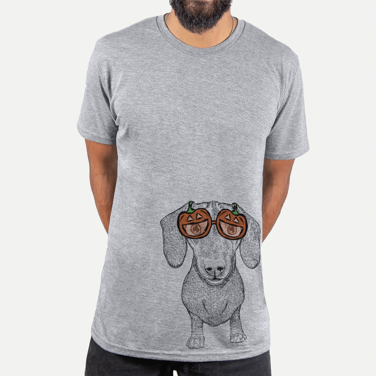 Hand-drawn sketch of Ernie the Mini Dachshund wearing pumpkin glasses on a Grey pumpkin collection, hanging on a wall