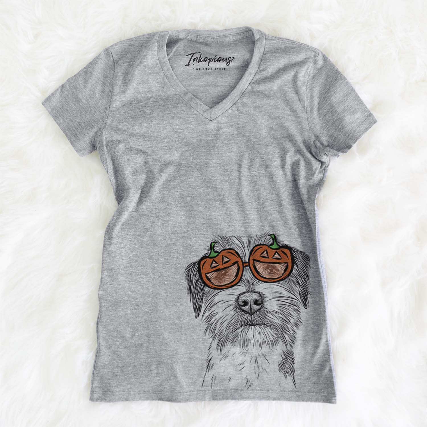 Hand-drawn sketch of Feis the Parson Russell Terrier wearing pumpkin glasses on a Grey pumpkin collection, on a hanger