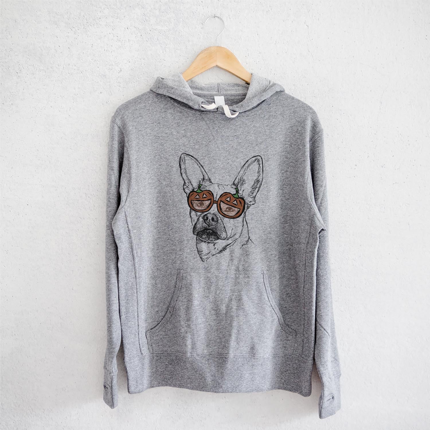 Hand-drawn sketch of Frankie the Mixed Breed wearing pumpkin glasses on a Grey pumpkin collection, on a hanger