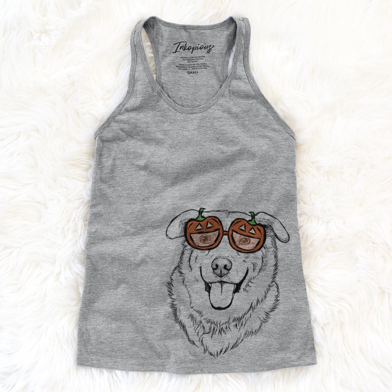 Hand-drawn sketch of Freeley the Mixed Breed wearing pumpkin glasses on a Grey pumpkin collection