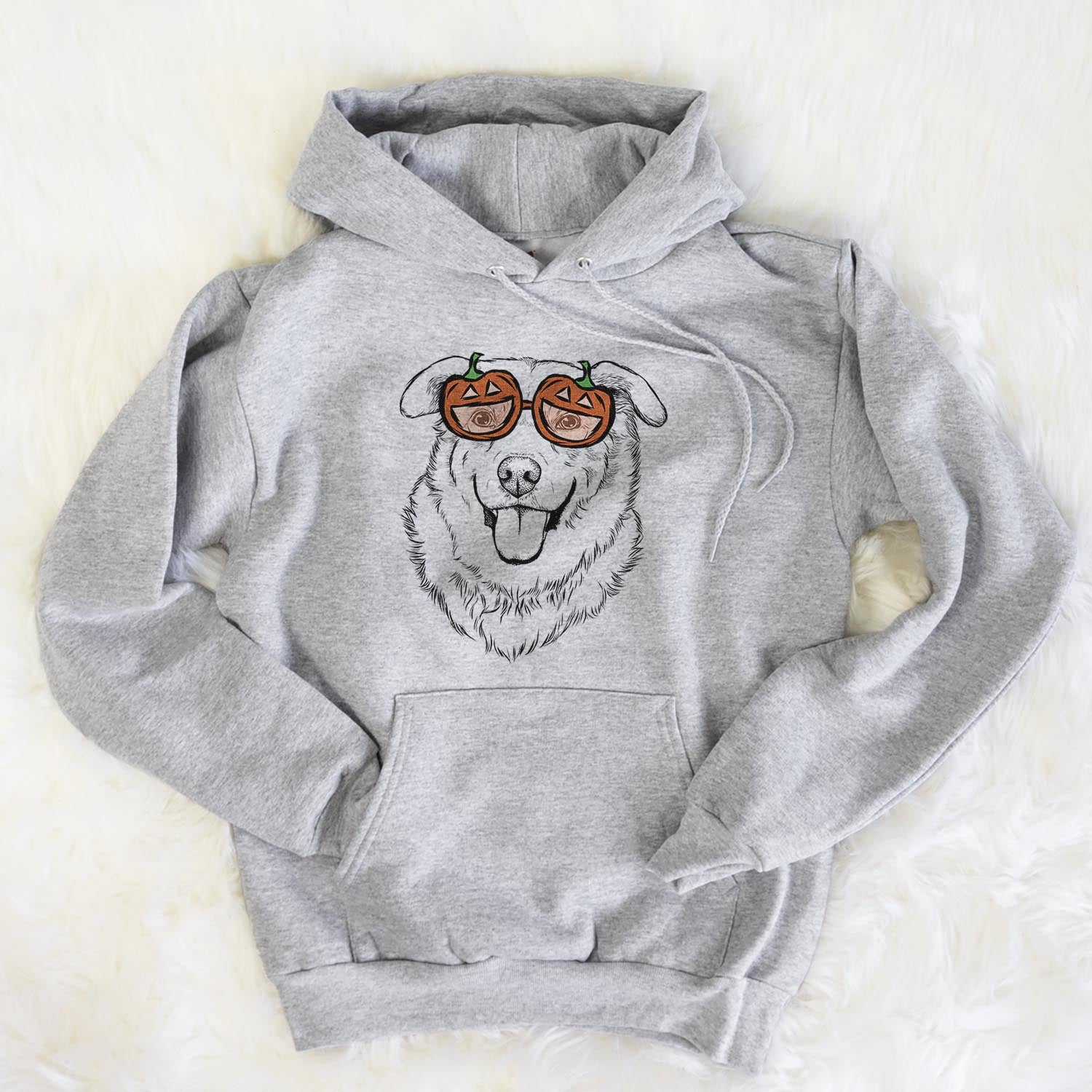 Hand-drawn sketch of Freeley the Mixed Breed wearing pumpkin glasses on a Grey pumpkin collection, flat lay