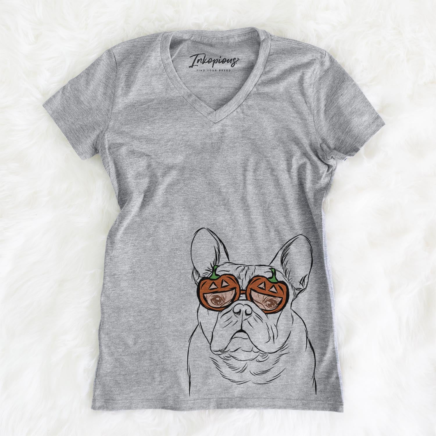 Hand-drawn sketch of Fudge the French Bulldog wearing pumpkin glasses on a Grey pumpkin collection, on a hanger