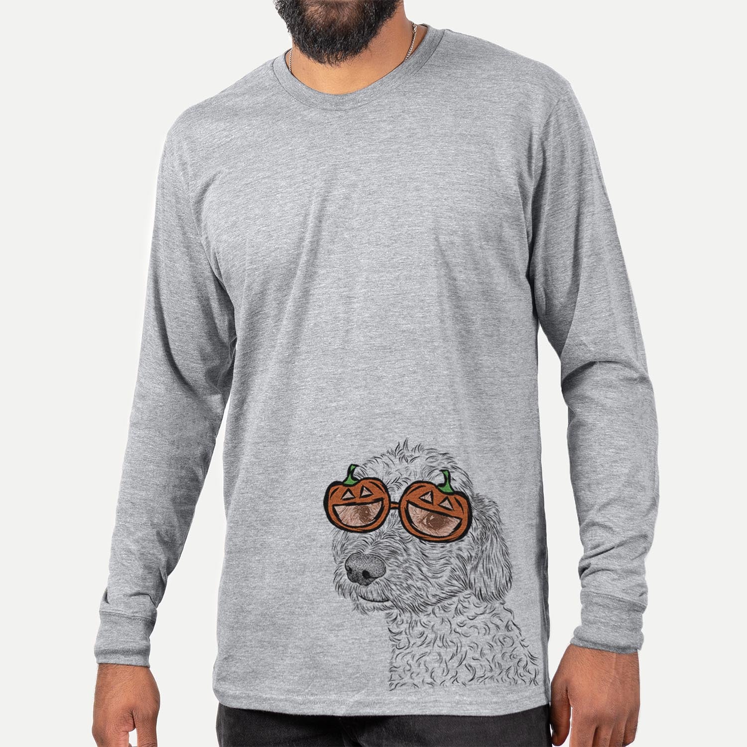 Hand-drawn sketch of Georgie Boy the Mixed Breed wearing pumpkin glasses on a Grey pumpkin collection, hanging on a wall