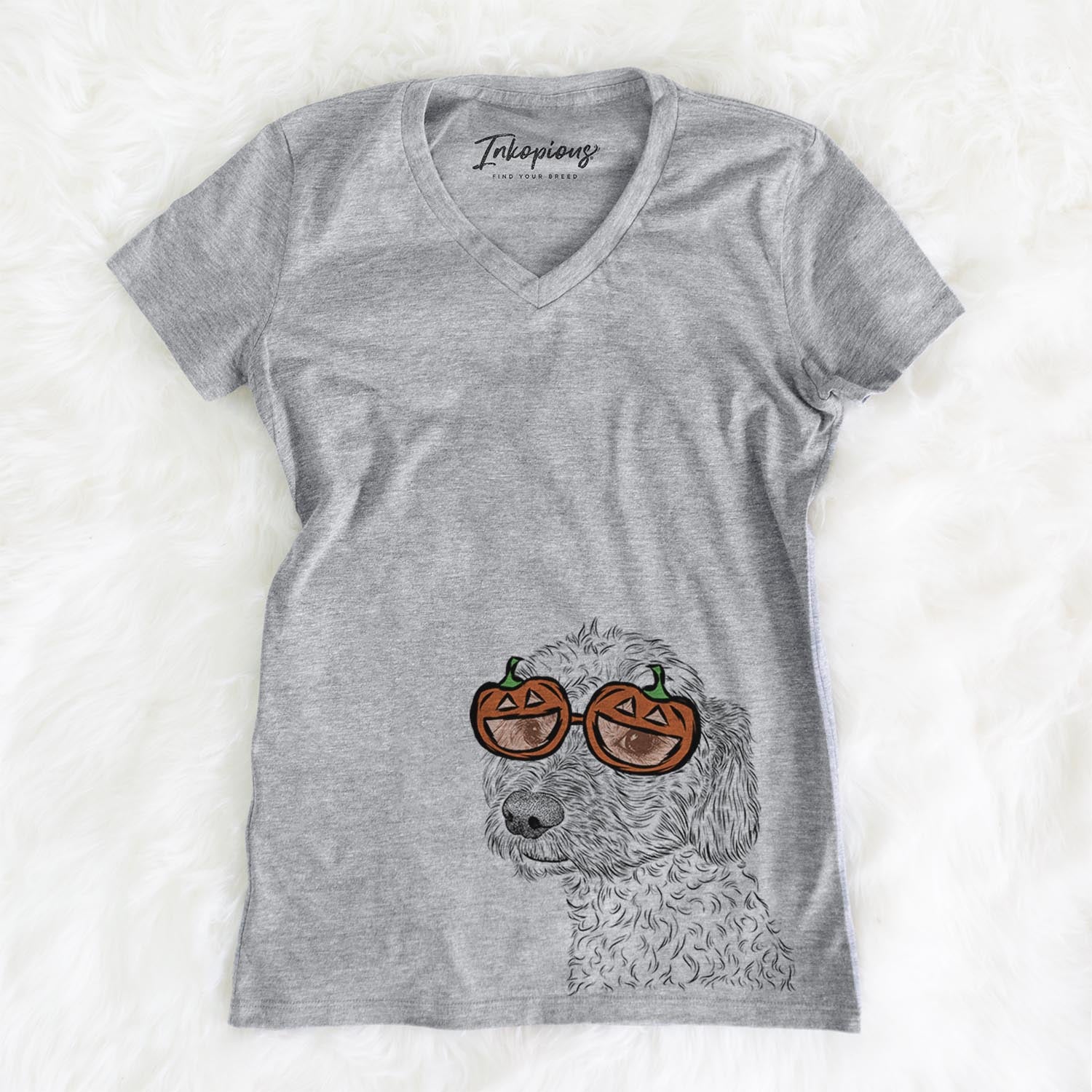 Hand-drawn sketch of Georgie Boy the Mixed Breed wearing pumpkin glasses on a Grey pumpkin collection, on a hanger