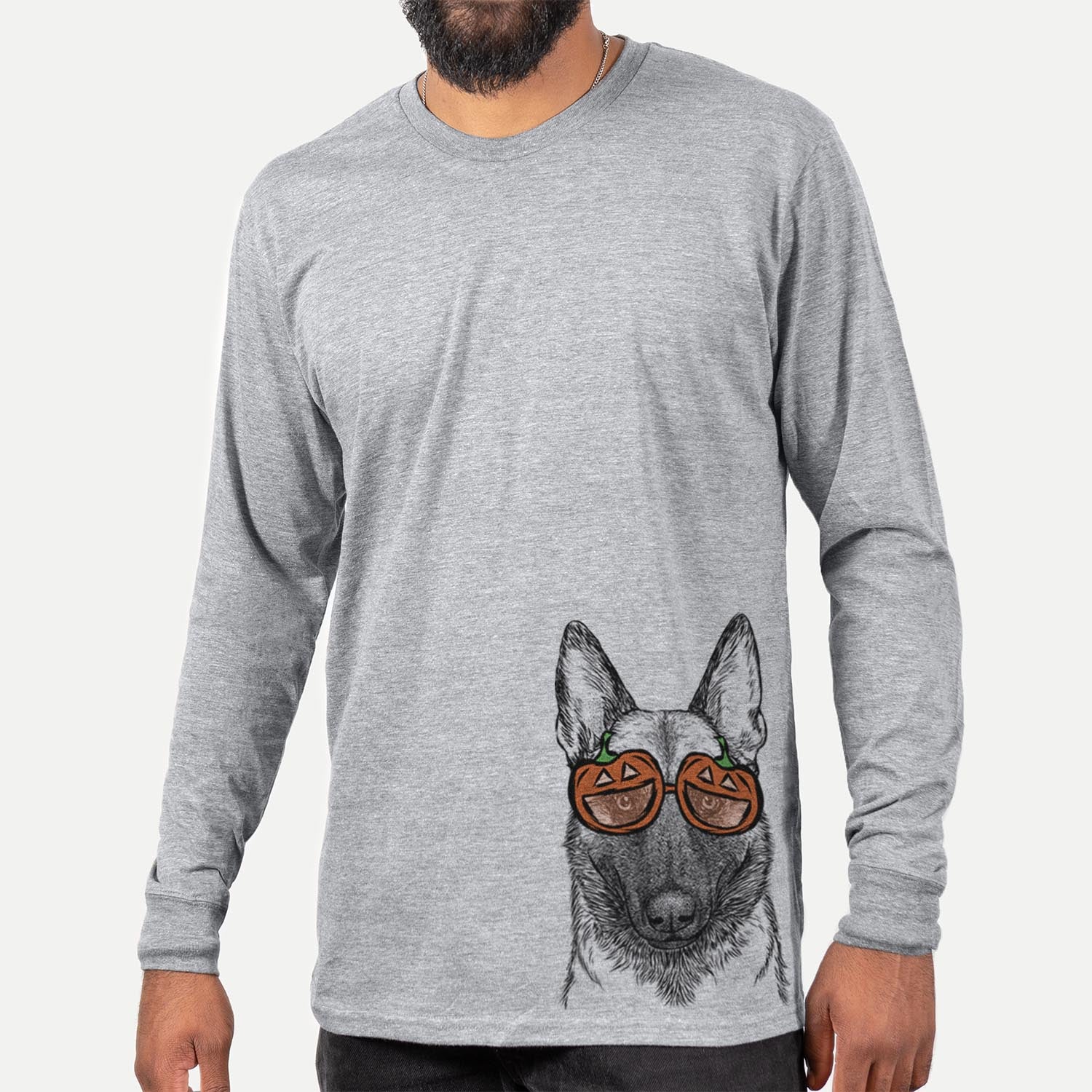 Hand-drawn sketch of Gunther the Belgian Malinois wearing pumpkin glasses on a Grey pumpkin collection, hanging on a wall