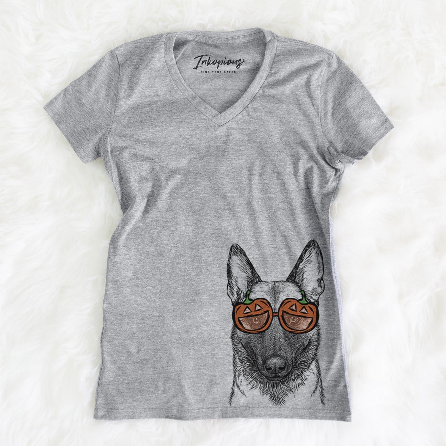 Hand-drawn sketch of Gunther the Belgian Malinois wearing pumpkin glasses on a Grey pumpkin collection, on a hanger