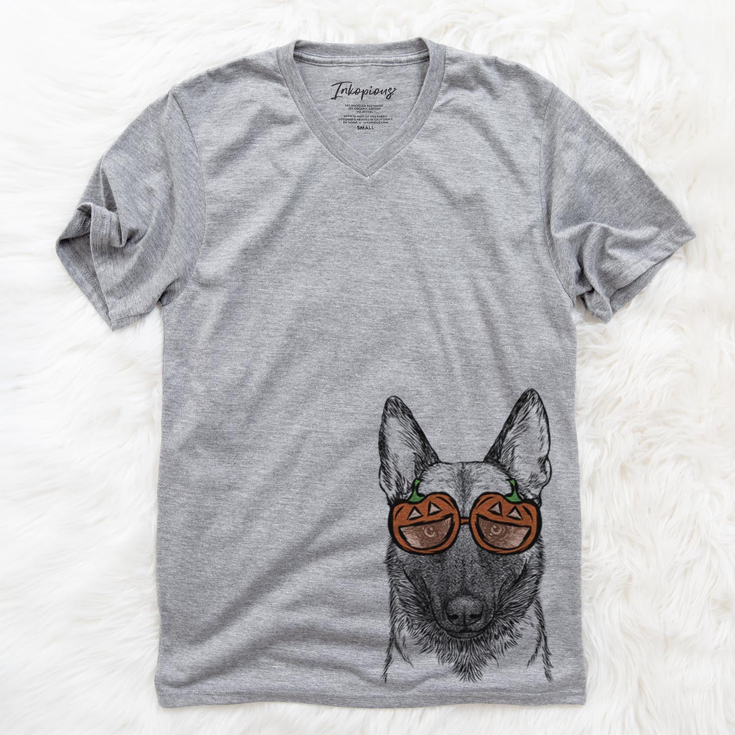 Hand-drawn sketch of Gunther the Belgian Malinois wearing pumpkin glasses on a Grey pumpkin collection