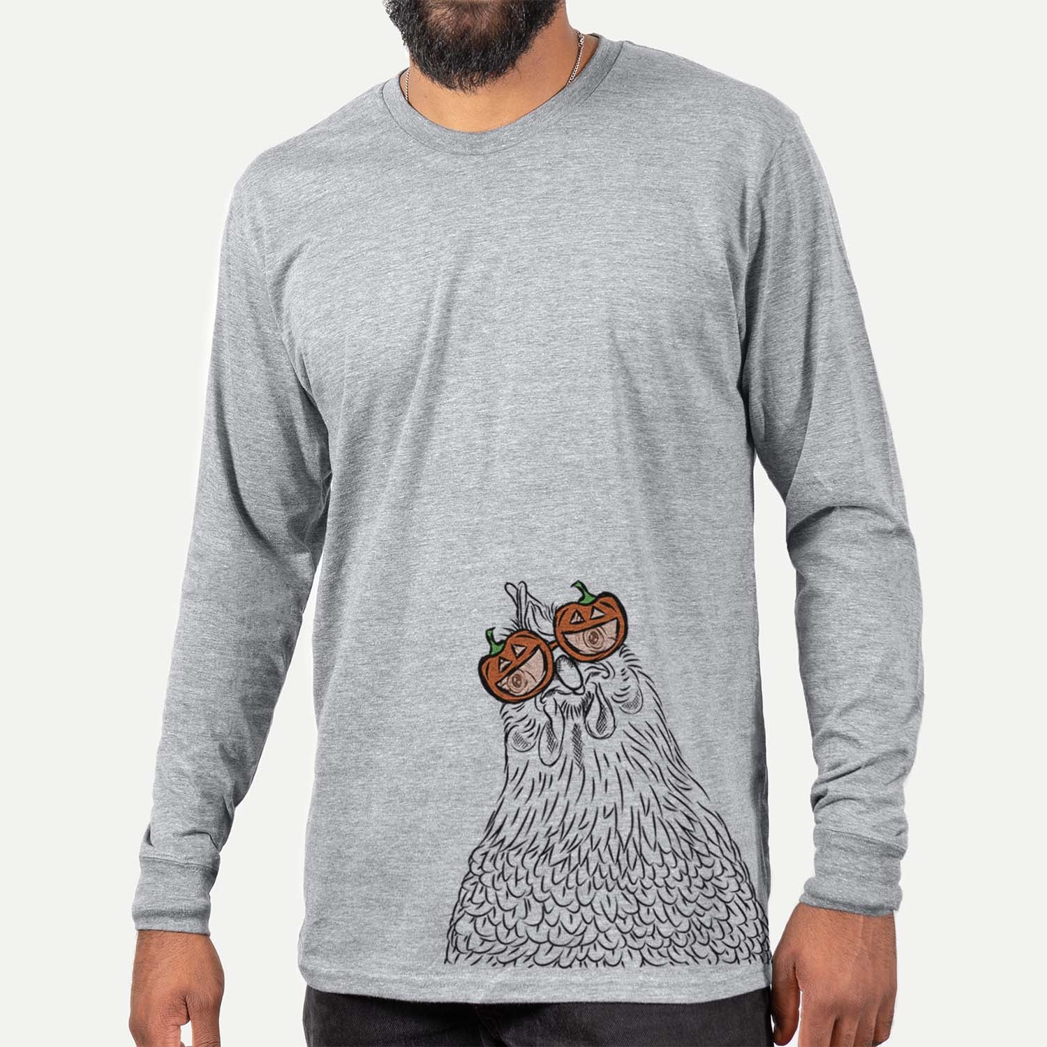 Hand-drawn sketch of Henrietta the Chicken wearing pumpkin glasses on a Grey pumpkin collection, hanging on a wall