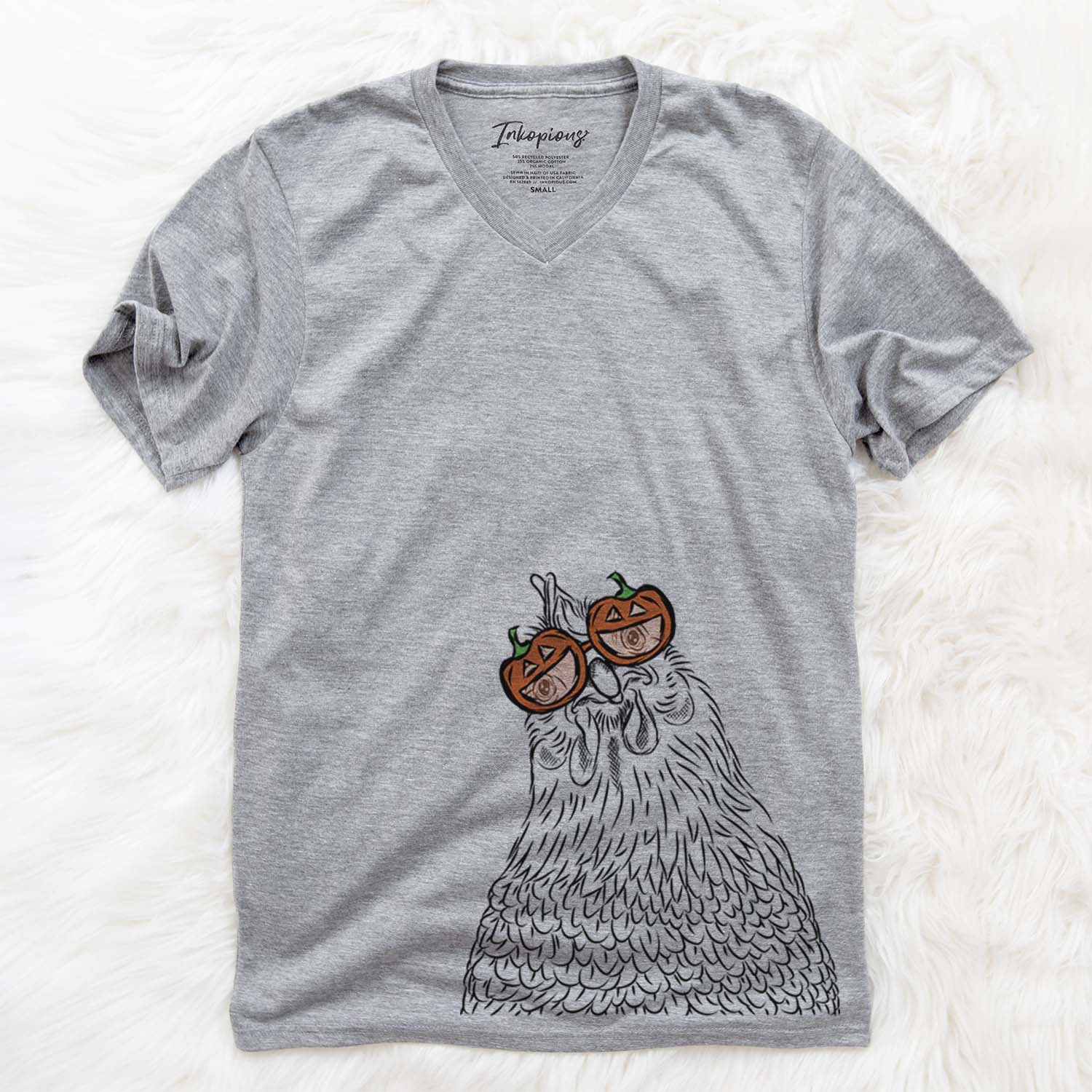Hand-drawn sketch of Henrietta the Chicken wearing pumpkin glasses on a Grey pumpkin collection