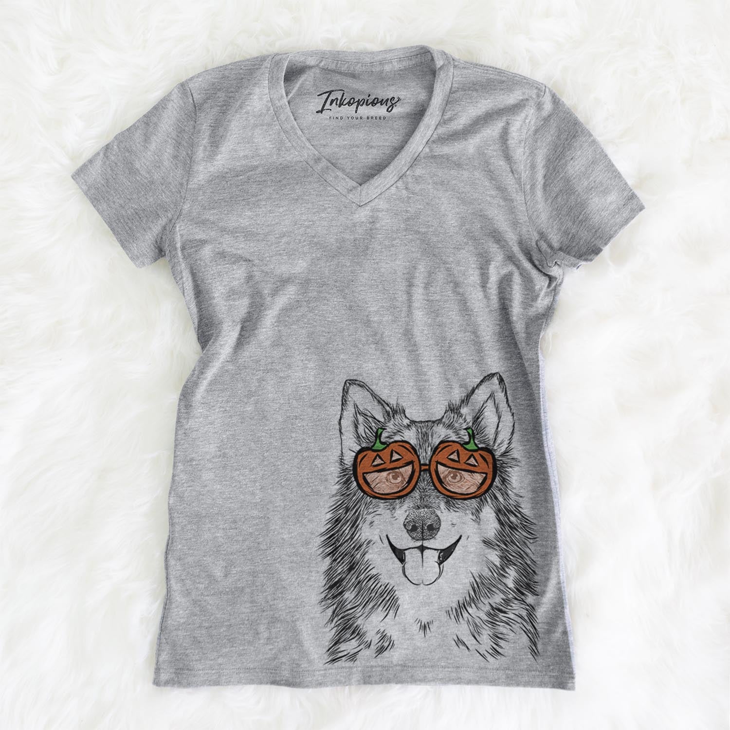 Hand-drawn sketch of Iben the Utonagan wearing pumpkin glasses on a Grey pumpkin collection, on a hanger