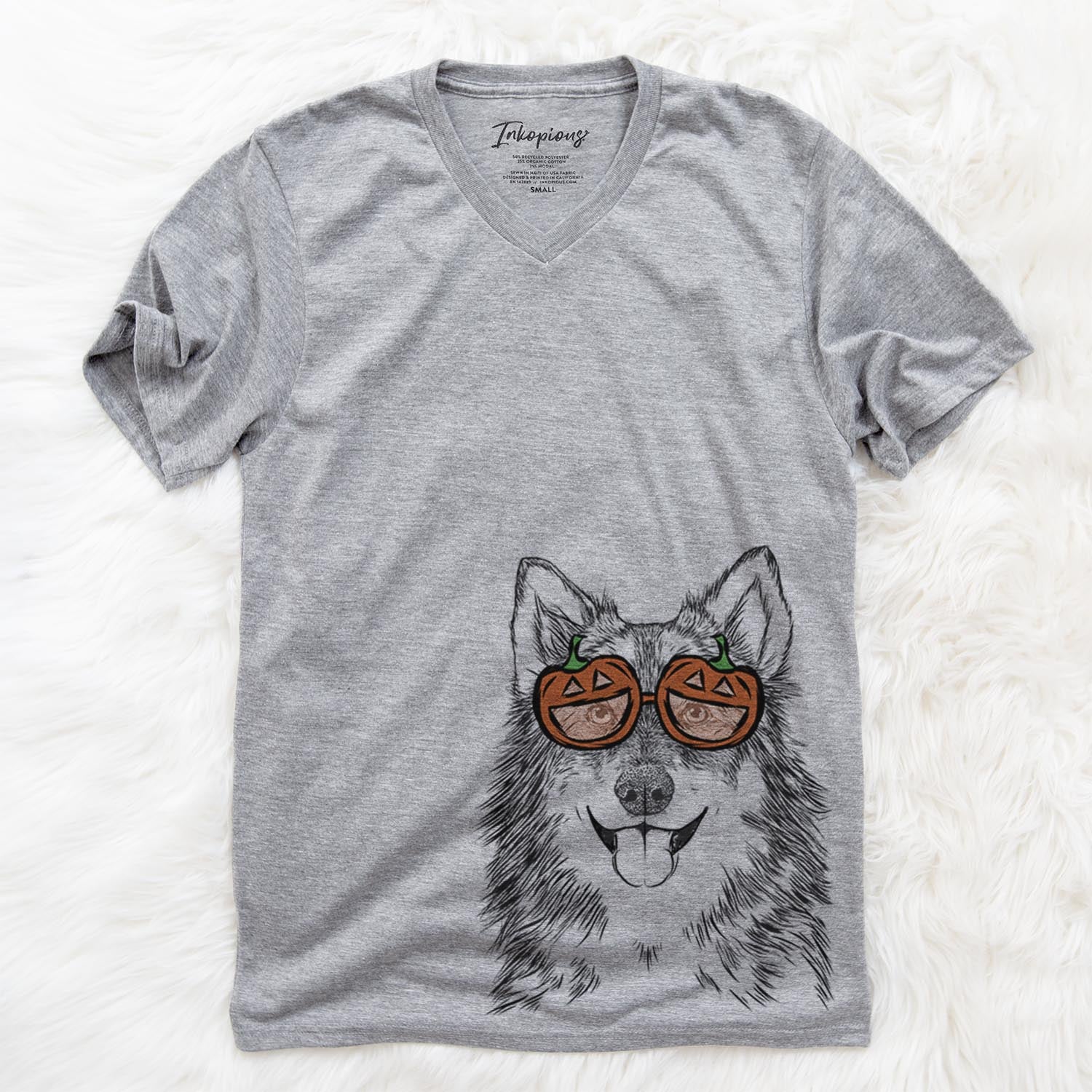Hand-drawn sketch of Iben the Utonagan wearing pumpkin glasses on a Grey pumpkin collection