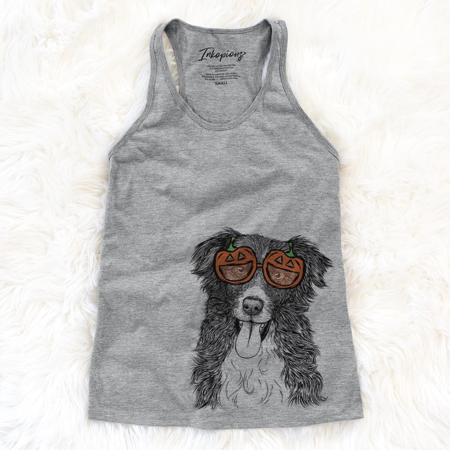 Hand-drawn sketch of Indi the Border Collie wearing pumpkin glasses on a Grey pumpkin collection