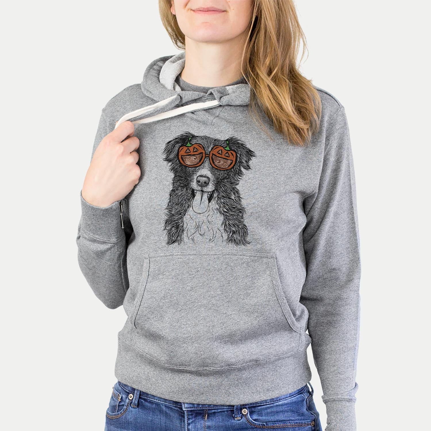 Hand-drawn sketch of Indi the Border Collie wearing pumpkin glasses on a Grey pumpkin collection, hanging on a wall