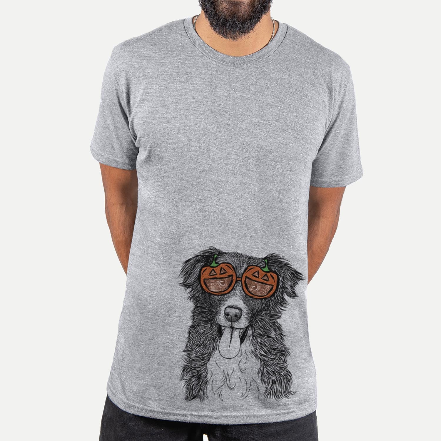 Hand-drawn sketch of Indi the Border Collie wearing pumpkin glasses on a Grey pumpkin collection, hanging on a wall